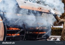 stock-photo-barbecue-smoke-barrel-large-barrel-for-barbecue-the-meat-is-fried-at-a-high-temper...jpg